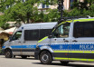 "dwa radiowozy policji"